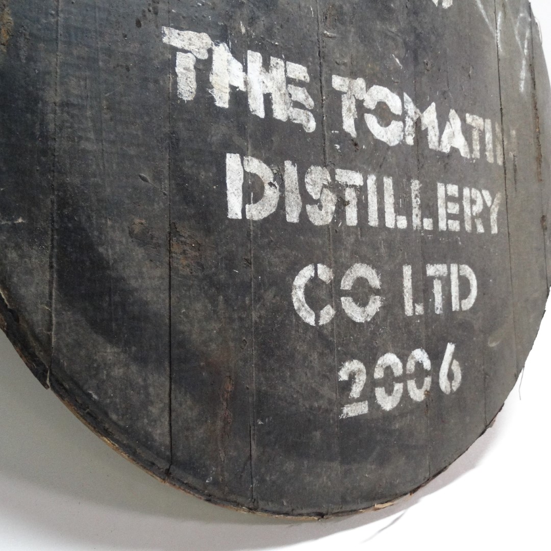 Tomatin Fassdeckel